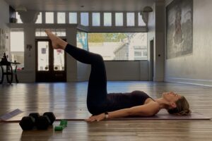 Woman exercising for heart health.